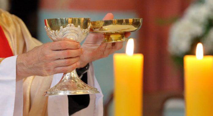 Priest celebrate mass at the church